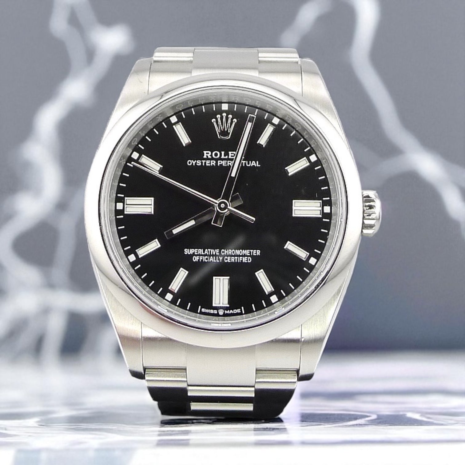 Rolex Oyster Perpetual - black dial - 36mm - preowned